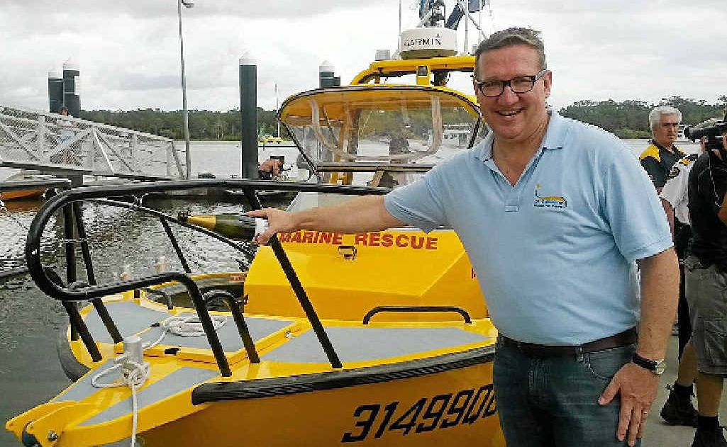 David Gibson helps launch the new rescue ship for the Tin Can Bay Coast Guard. David Gibson helps launch the new rescue ship for the Tin Can Bay Coast Guard.